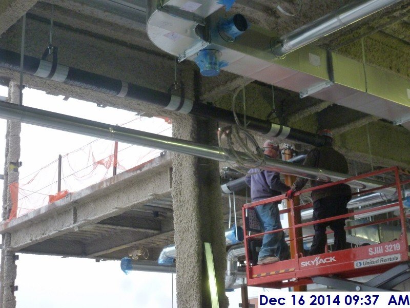 Installing storm piping at the 3rd floor Facing North